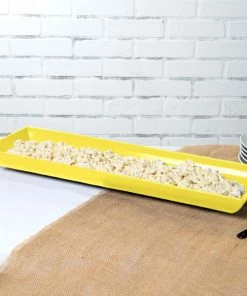 Tablecraft Professional Bakeware Tablecraft CW11047Y 25" X 8" X 2 1/2" Yellow Cast Aluminum Flared Rectangular Platter
