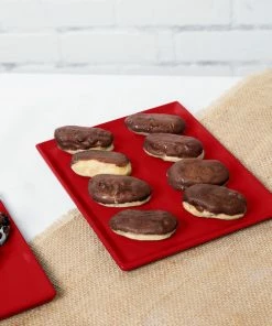 Tablecraft Professional Bakeware Tablecraft CW2104R 8 1/2" X 6 3/4" X 3/8" Red Cast Aluminum Rectangular Cooling Platter