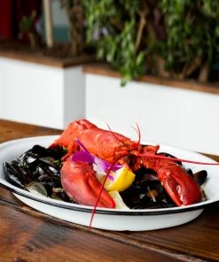 Crow Canyon Home V61BLA Vintage 18" X 13" White Enamelware Oval Platter With Black Rolled Rim